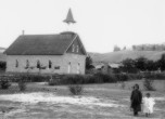 Children with the Bluff stone meetinghouse in the background. Who are the children? Charles Goodman Photo